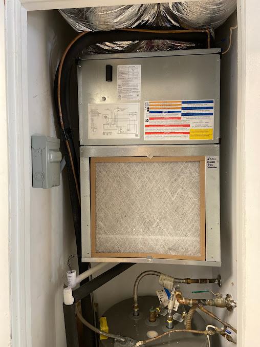 AC installation in Spring Hill and Columbia TN — indoor air handler in a closet