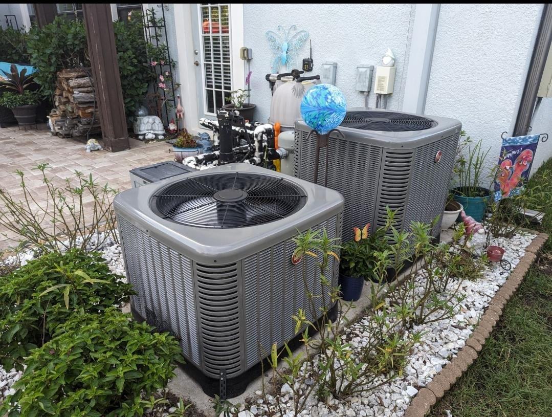 AC installation in Columbia TN — two condensers in a planted yard