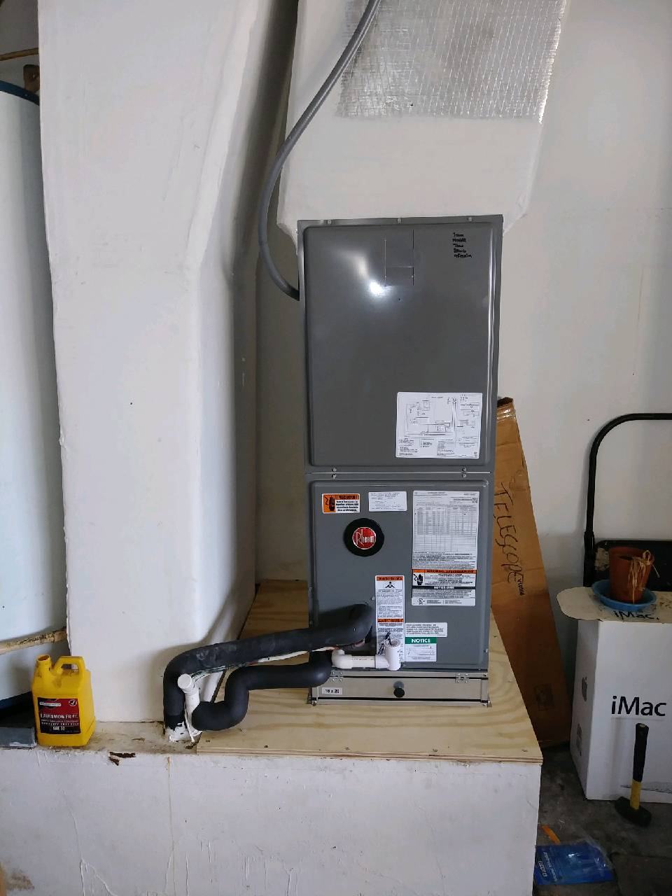 AC installation in Spring Hill TN — indoor unit on plywood